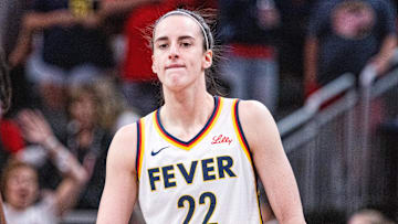 Jul 9, 2025; Indianapolis, Indiana, USA; Indiana Fever guard Caitlin Clark (22) in the first half against Golden State Valkyries at Gainbridge Fieldhouse. Mandatory Credit: Trevor Ruszkowski-Imagn Images