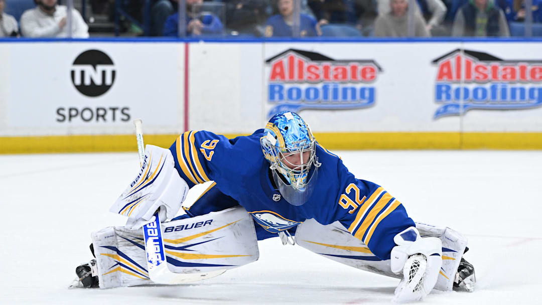 Apr 15, 2026; Buffalo, New York, USA; Buffalo Sabres goaltender Colten Ellis (92) stretches to cover th puck in the third period against the Dallas Stars at KeyBank Center. Mandatory Credit: Mark Konezny-Imagn Images