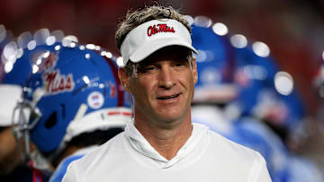 Nov 15, 2025; Oxford, Mississippi, USA; Mississippi Rebels head coach Lane Kiffin looks on during warm ups prior to the game  against the Florida Gators at Vaught-Hemingway Stadium. Mandatory Credit: Petre Thomas-Imagn Images