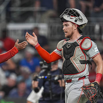 Sep 9, 2024; Cumberland, Georgia, USA; Cincinnati Reds relief pitcher Alexis Diaz (43) and catcher Tyler Stephenson (37) react after defeating the Atlanta Braves at Truist Park. Mandatory Credit: Dale Zanine-Imagn Images