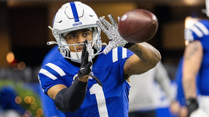 Dec 31, 2023; Indianapolis, Indiana, USA; Indianapolis Colts wide receiver Josh Downs (1) catches a ball during warmups before the game against the Las Vegas Raiders  at Lucas Oil Stadium. Mandatory Credit: Trevor Ruszkowski-Imagn Images