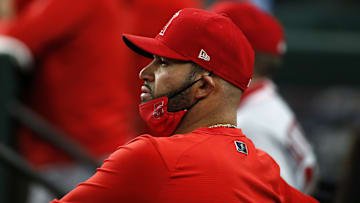 Apr 28, 2021; Arlington, Texas, USA; Los Angeles Angels first baseman Albert Pujols (5) on the bench during the game against the Texas Rangers at Globe Life Field. Mandatory Credit: Tim Heitman-Imagn Images