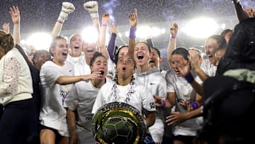 Orlando Pride forward Marta (10) holds the 2024 NWSL Shield awarded to them at the end of their match against Washington Spirit 