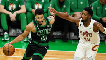 Boston Celtics forward Jayson Tatum (0) drives the ball.