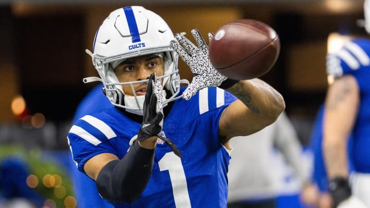 Dec 31, 2023; Indianapolis, Indiana, USA; Indianapolis Colts wide receiver Josh Downs (1) catches a ball during warmups before the game against the Las Vegas Raiders  at Lucas Oil Stadium. 