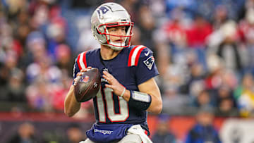 Dec 28, 2024; Foxborough, Massachusetts, USA; New England Patriots quarterback Drake Maye (10) looks to pass the ball against the Los Angeles Chargers in the second half at Gillette Stadium. Mandatory Credit: David Butler II-Imagn Images