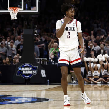 Mar 28, 2024; Boston, MA, USA; Connecticut Huskies guard Tristen Newton (2) reacts against the San Diego State Aztecs in the semifinals of the East Regional of the 2024 NCAA Tournament at TD Garden. Mandatory Credit: Winslow Townson-USA TODAY Sports