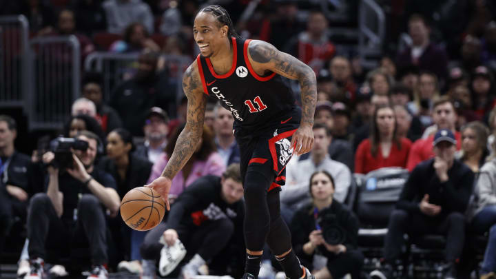 Apr 1, 2024; Chicago, Illinois, USA; Chicago Bulls forward DeMar DeRozan (11) brings the ball up court against the Atlanta Hawks during the first half at United Center. Mandatory Credit: Kamil Krzaczynski-USA TODAY Sports