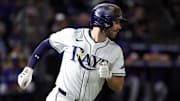 Sep 16, 2025; St. Petersburg, Florida, USA; Tampa Bay Rays second baseman Brandon Lowe (8) hits a RBI single ninth inning against the Toronto Blue Jays at George M. Steinbrenner Field. 