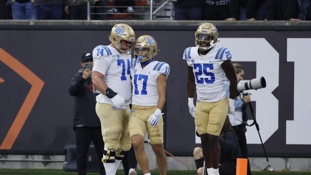 Oct 14, 2023; Corvallis, Oregon, USA; UCLA Bruins wide receiver Logan Loya (17) celebrates with teammates after scoring a touchdown during the first half against the Oregon State Beavers at Reser Stadium. Mandatory Credit: Soobum Im-USA TODAY Sports