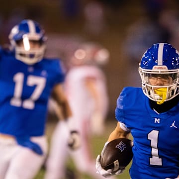 McCallie's Enrique Leclair (1) runs with the ball during the TSSAA BlueCross Bowl Division II-AAA championship game at Finley Stadium in Chattanooga, Tenn. on Thursday, Nov 30, 2023.