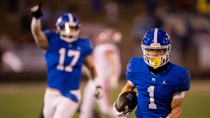 McCallie's Enrique Leclair (1) runs with the ball during the TSSAA BlueCross Bowl Division II-AAA championship game at Finley Stadium in Chattanooga, Tenn. on Thursday, Nov 30, 2023.