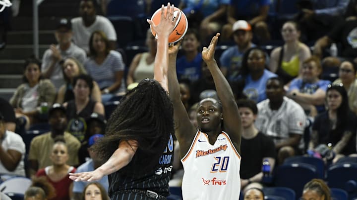 Jun 21, 2025; Chicago, Illinois, USA; Phoenix Mercury center Murjanatu Musa (20) shoots against the Chicago Sky during the first half at Wintrust Arena. Mandatory Credit: Matt Marton-Imagn Images