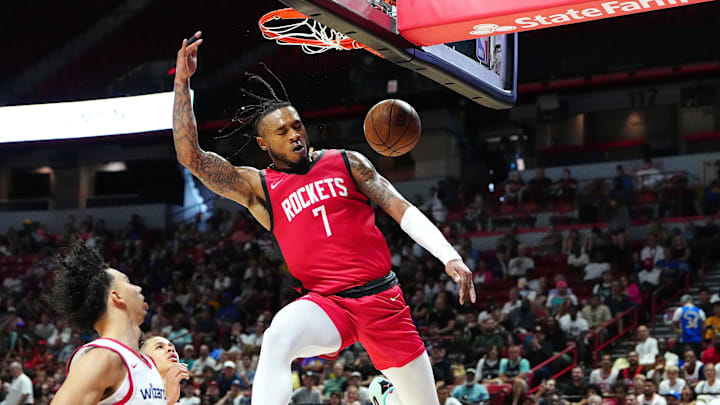 Jul 14, 2024; Las Vegas, NV, USA; Houston Rockets forward Cam Whitmore (7) dunks against the Washington Wizards during the third quarter at Thomas & Mack Center. Mandatory Credit: Stephen R. Sylvanie-Imagn Images