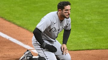 Chicago White Sox outfielder Mike Tauchman (18) was tagged out at home plate to end the game against the Cleveland Guardians at Progressive Field. 