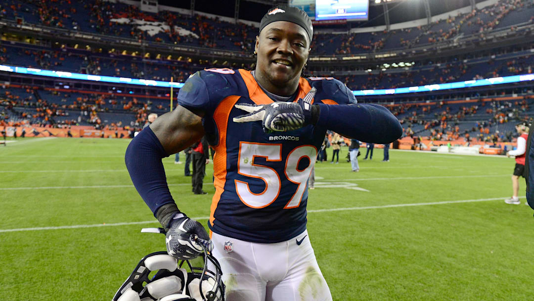 Nov 1, 2015; Denver, CO, USA; Denver Broncos inside linebacker Danny Trevathan (59) celebrates the win over the Green Bay Packers at Sports Authority Field at Mile High. The Broncos defeated the Packer 29-10. Mandatory Credit: Ron Chenoy-Imagn Images