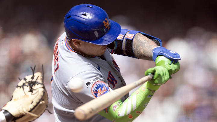 Apr 5, 2026; San Francisco, California, USA; New York Mets catcher Francisco Alvarez (4) is interfered with by San Francisco Giants catcher Patrick Bailey as he swings during the seventh inning at Oracle Park. Mandatory Credit: D. Ross Cameron-Imagn Images