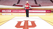 Indiana men's basketball coach Darian DeVries poses on the Simon Skjodt Assembly Hall court on March 18, 2025, the day he was introduced as the new coach.