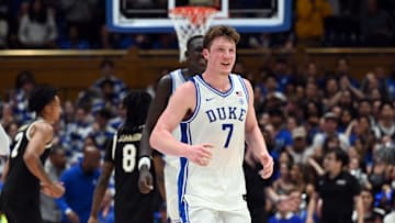 Mar 3, 2025; Durham, North Carolina, USA;  Duke Blue Devils forward Kon Knueppel (7) reacts during the second half against the Wake Forest Demon Deacons at Cameron Indoor Stadium.  The Blue Devils won 93-60. Mandatory Credit: Rob Kinnan-Imagn Images