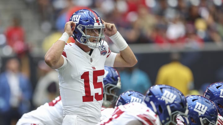 Aug 17, 2024; Houston, Texas, USA; New York Giants quarterback Tommy DeVito (15) at the line of scrimmage during the third quarter against the Houston Texans at NRG Stadium.  