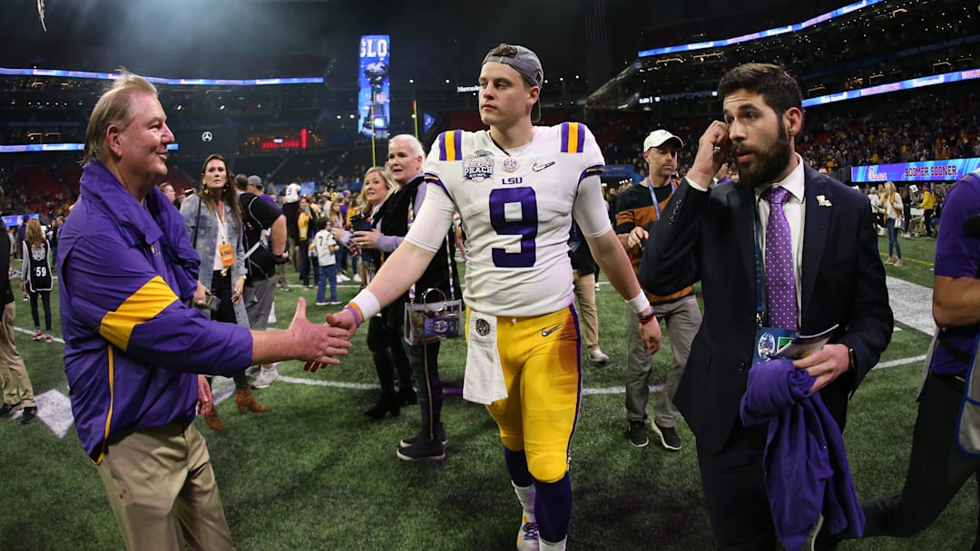 LSU Tigers quarterback Joe Burrow (9) leaves the field after defeating the Oklahoma Sooners in the 2019 Peach Bowl college football playoff semifinal game at Mercedes-Benz Stadium. 