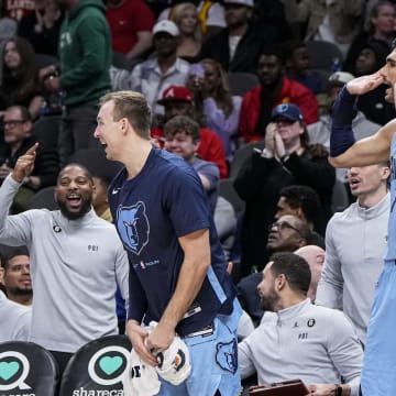 Mar 26, 2023; Atlanta, Georgia, USA; The Memphis Grizzlies bench reacts after a basket against the Atlanta Hawks during the second half at State Farm Arena. Mandatory Credit: Dale Zanine-USA TODAY Sports