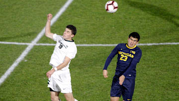 Michigan State's Michael Miller, left, and Michigan's Marc Ybarra (23) vie for a header, Tuesday, Oct. 23, 2018, in East Lansing, Mich. The teams played to a 1-1 draw.

Michigan At Michigan State Men S Soccer