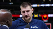 Denver Nuggets center Nikola Jokic (15) is interviewed following the win against the Miami Heat in the second half at Ball Arena.