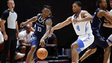 July 5, 2025; Salt Lake City, Utah, USA; Grizzlies rookie guard Javon Small (10) being guarded by Oklahoma City guard Chris Youngblood (40) during NBA Salt Lake City Summer League