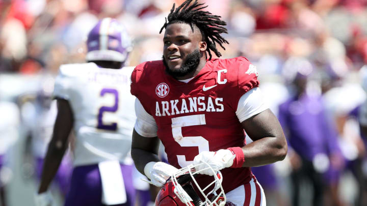 Sep 2, 2023; Little Rock, Arkansas, USA; Arkansas Razorbacks running back Raheim Sanders (5) returns to the sidelines after losing his helmet on the previous play in the second quarter against the Western Carolina Catamounts at War Memorial Stadium. Mandatory Credit: Nelson Chenault-USA TODAY Sports