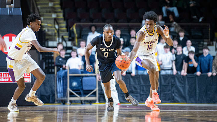 Portland High School senior Loic Ramazami keyed the No. 6 Bulldogs to the Class A South title Saturday night at the Cross Insurance Arena in Portland.