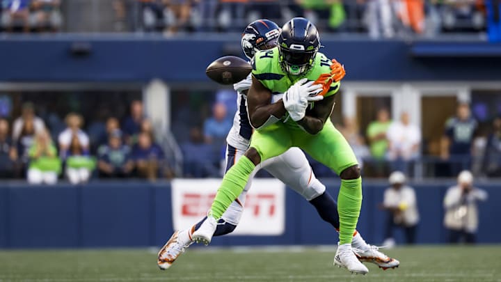 Sep 12, 2022; Seattle, Washington, USA; Denver Broncos cornerback Pat Surtain II (2) breaks up a pass intended for Seattle Seahawks wide receiver DK Metcalf (14) during the fourth quarter at Lumen Field.