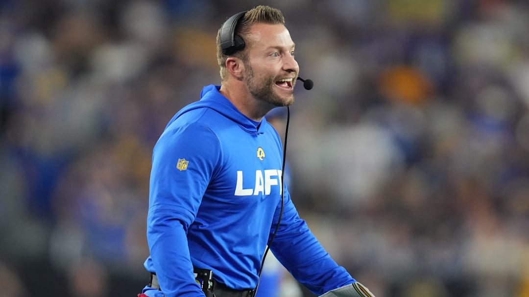 Los Angeles Rams head coach Sean McVay smiles after his team scores a touchdown against the Minnesota Vikings during their playoff game at State Farm Stadium on Jan. 13, 2025, in Glendale.