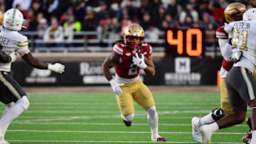 Nov 15, 2025; Chestnut Hill, Massachusetts, USA; Boston College Eagles running back Turbo Richard (2) runs the ball during the first half against Georgia Tech Yellow Jackets at Alumni Stadium. Mandatory Credit: Bob DeChiara-Imagn Images