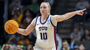 Mar 29, 2025; Birmingham, AL, USA; TCU Horned Frogs guard Hailey Van Lith (10) signals to her teammates during the second half of a Sweet 16 NCAA Tournament basketball game against the Notre Dame Fighting Irish at Legacy Arena. Mandatory Credit: Vasha Hunt-Imagn Images
