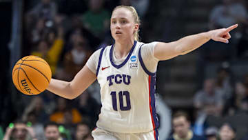Mar 29, 2025; Birmingham, AL, USA; TCU Horned Frogs guard Hailey Van Lith (10) signals to her teammates during the second half of a Sweet 16 NCAA Tournament basketball game against the Notre Dame Fighting Irish at Legacy Arena. Mandatory Credit: Vasha Hunt-Imagn Images
