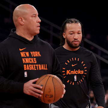 Nov 15, 2024; New York, New York, USA; New York Knicks guard Jalen Brunson (11) warms up with father and coach Rick Brunson before a game against the Brooklyn Nets at Madison Square Garden. Mandatory Credit: Brad Penner-Imagn Images
