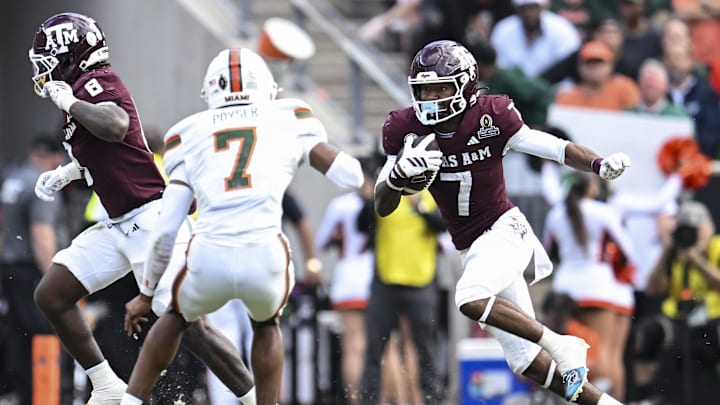 Dec 20, 2025; College Station, TX, USA; Texas A&M Aggies wide receiver KC Concepcion (7) runs the ball against the Miami Hurricanes during the second half at Kyle Field. Mandatory Credit: Maria Lysaker-Imagn Images
