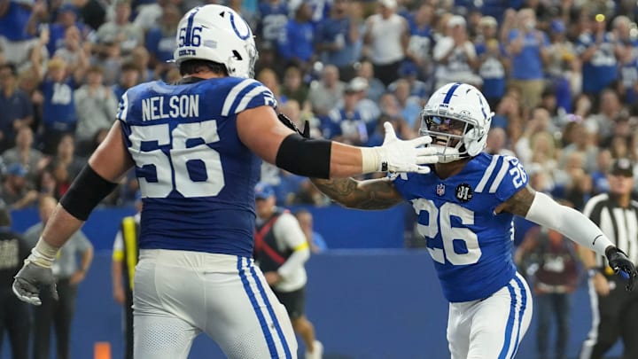 Indianapolis Colts guard Quenton Nelson (56) and Indianapolis Colts running back Ameer Abdullah (26) celebrate after Abdullah scores a touchdown Sunday, Oct. 5, 2025, during a game at Lucas Oil Stadium in Indianapolis. The Colts defeated the Raiders 40-6.