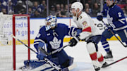 May 5, 2025; Toronto, Ontario, CAN; Toronto Maple Leafs goaltender Anthony Stolarz (41) and Florida Panthers forward Sam Bennett (9) battle for position in front of the goal during the second period of the second round of the 2025 Stanley Cup Playoffs at Scotiabank Arena. Mandatory Credit: John E. Sokolowski-Imagn Images