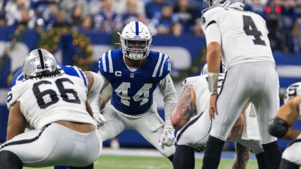 Colts linebacker Zaire Franklin (blue jersey with white pants/helmet) gets ready for a play on defense. 