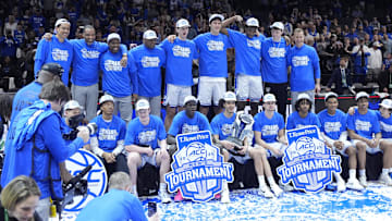 The Duke Blue Devils celebrate after winning the 2025 ACC Conference Championship game against the Louisville Cardinals.