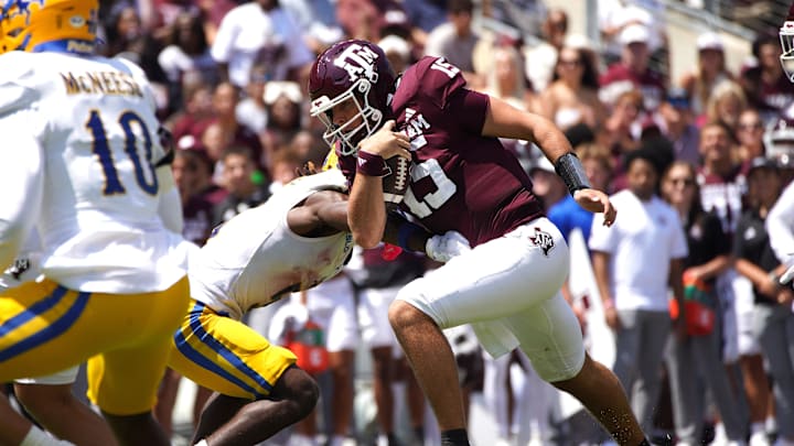 Sep 7, 2024; College Station, Texas, USA; Texas A&M Aggies quarterback Conner Weigman (15) runs the ball during the second quarter against the McNeese State Cowboys at Kyle Field. Mandatory Credit: Dustin Safranek-Imagn Images
