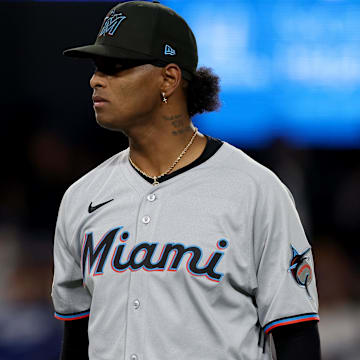 Apr 28, 2025; Los Angeles, California, USA; Miami Marlins pitcher Edward Cabrera (27) reacts after getting out of a bases loaded jam during the third inning against the Los Angeles Dodgers at Dodger Stadium. Mandatory Credit: Jason Parkhurst-Imagn Images