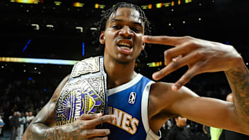 Capitanes Guard Dink Pate #1 celebrating after the NBA G...