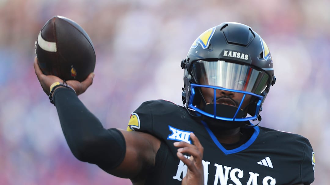 Kansas Jayhawks quarterback Jalon Daniels (6) throws a pass during the first half of the game against West Virginia Mountaineers at David Booth Kansas Memorial Stadium on Sept. 20, 2025. Kansas Jayhawks quarterback Jalon Daniels (6) throws a pass during the first half of the game against West Virginia Mountaineers at David Booth Kansas Memorial Stadium on Sept. 20, 2025.