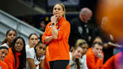 Mar 22, 2025; Storrs, Connecticut, USA; Oklahoma State Cowgirls head coach Jacie Hoyt watches from the sideline as they take on the South Dakota State Jackrabbits at Harry A. Gampel Pavilion. Mandatory Credit: David Butler II-Imagn Images