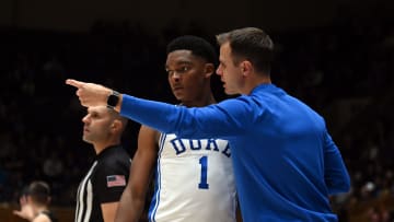 Nov 6, 2023; Durham, North Carolina, USA; Duke basketball head coach Jon Scheyer and guard Caleb Foster