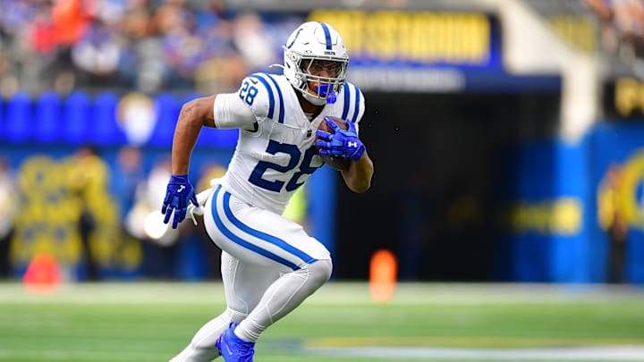 Sep 28, 2025; Inglewood, California, USA; Former Wisconsin Badgers running back Jonathan Taylor (28) runs the ball for the Indianapolis Colts against the Los Angeles Rams during the first half at SoFi Stadium.