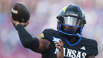 Kansas Jayhawks quarterback Jalon Daniels (6) throws a pass during the first half of the game against West Virginia Mountaineers at David Booth Kansas Memorial Stadium on Sept. 20, 2025.